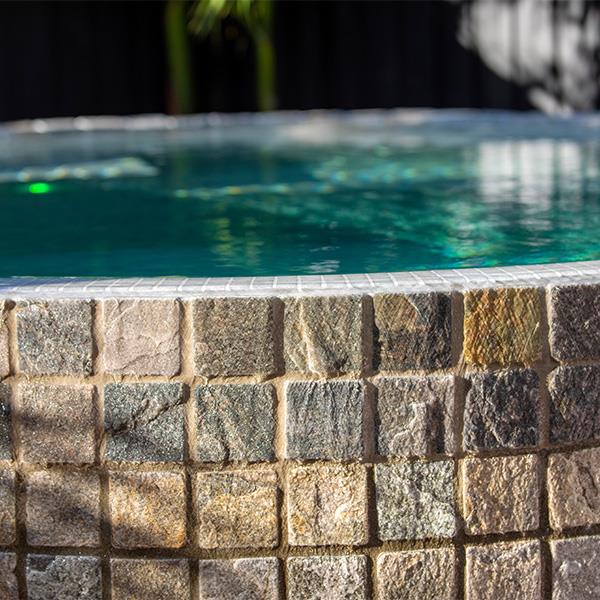 circle pool with stone tiles